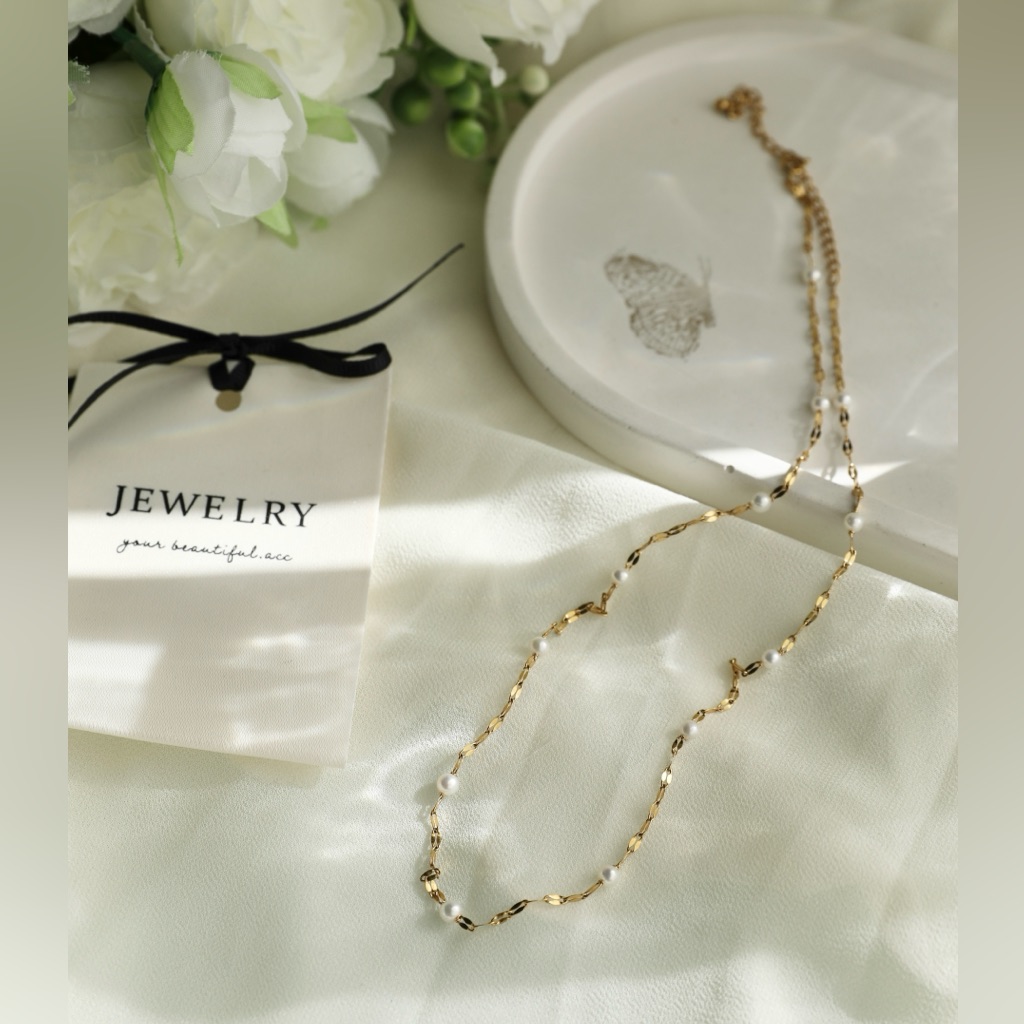 Freshwater pearl station necklace photographed for a marketplace listing